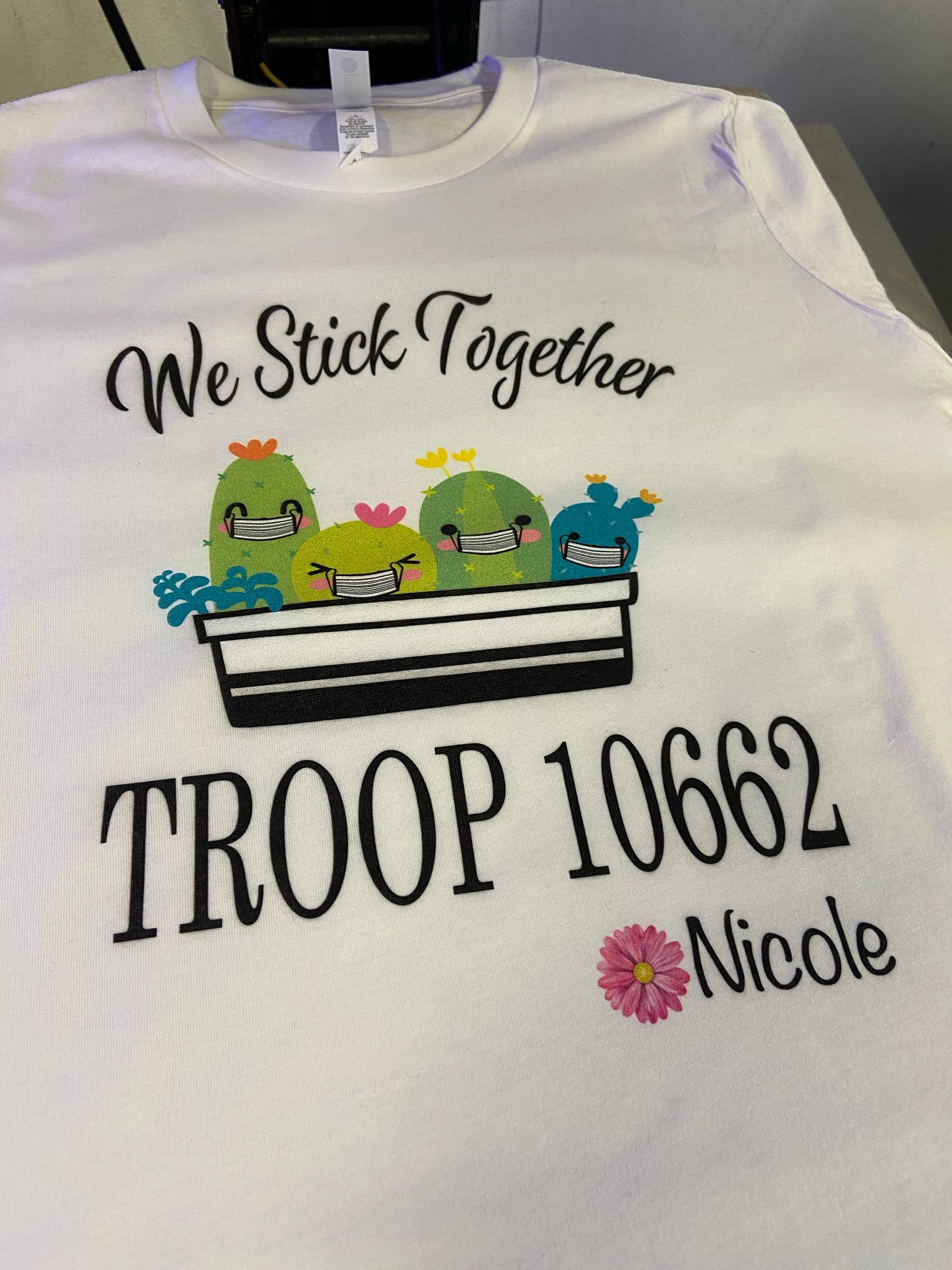 The cutest colorful Girl Scout Tees ! Personalized with troop number , masks or no masks and name   Cactus can be with or without masks - please note in personalization section when you check out   We stick together tee with names and troop number personalized on each shirt