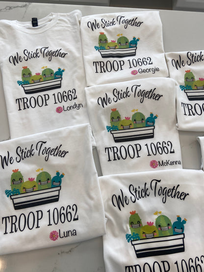 The cutest colorful Girl Scout Tees ! Personalized with troop number , masks or no masks and name   Cactus can be with or without masks - please note in personalization section when you check out   We stick together tee with names and troop number personalized on each shirt